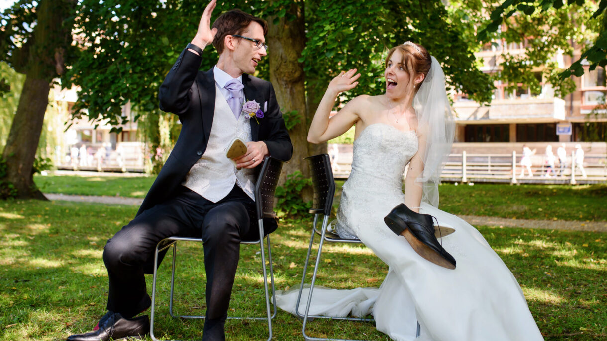 bride and groom giving each other high five