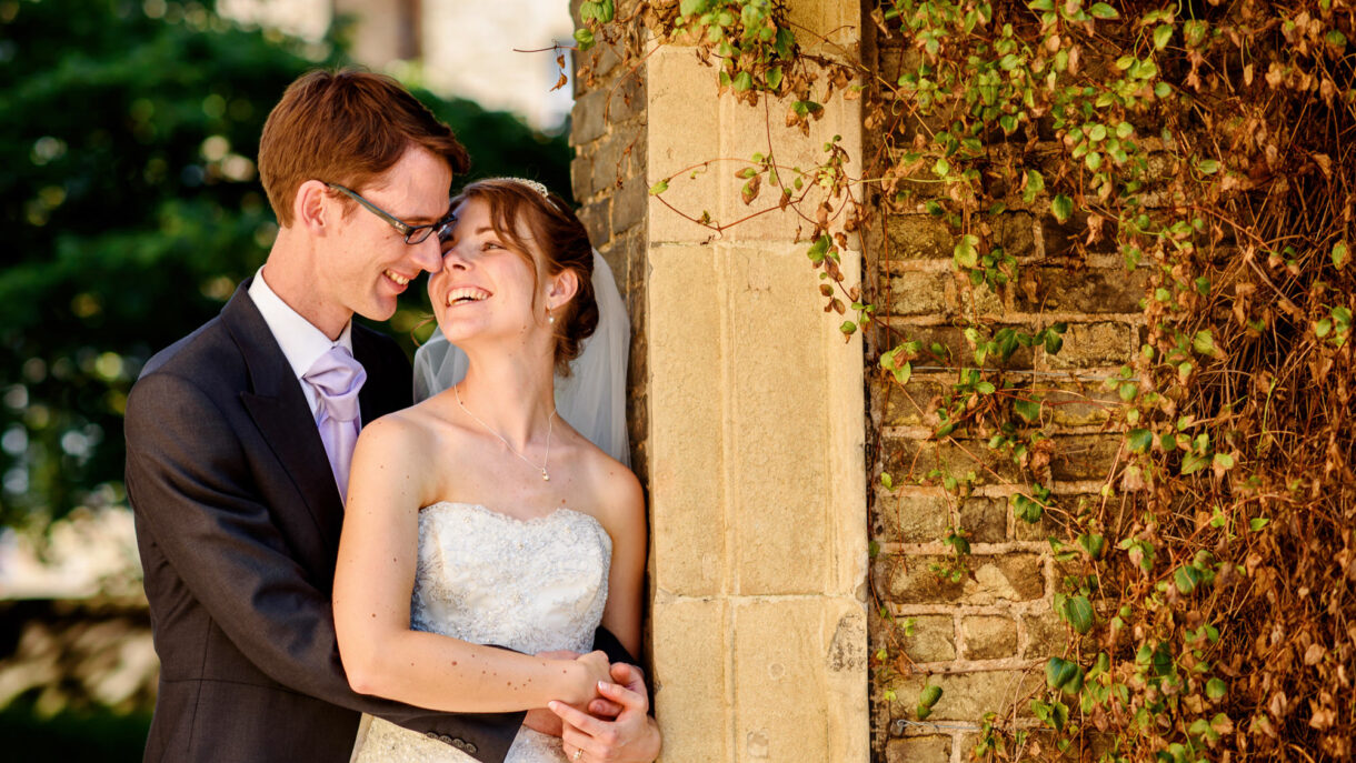 bride and groom looking at each other lovingly