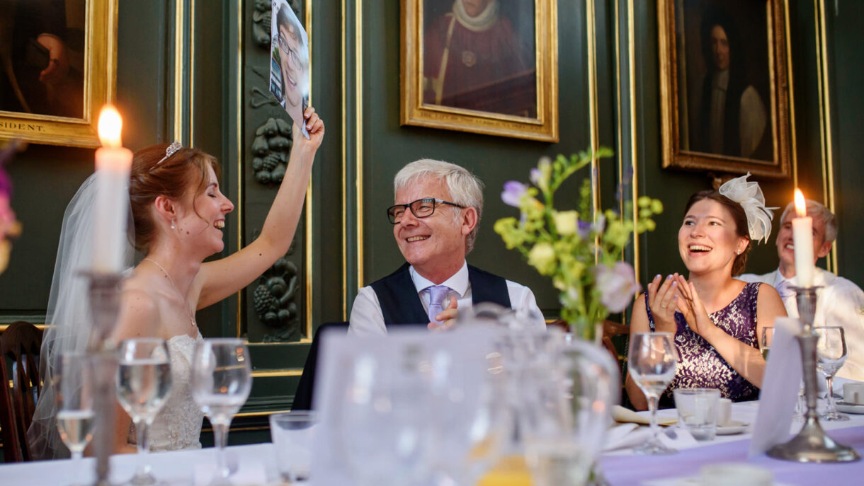 bride laughing during speeches