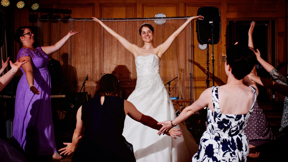 bride and bridesmaids dancing