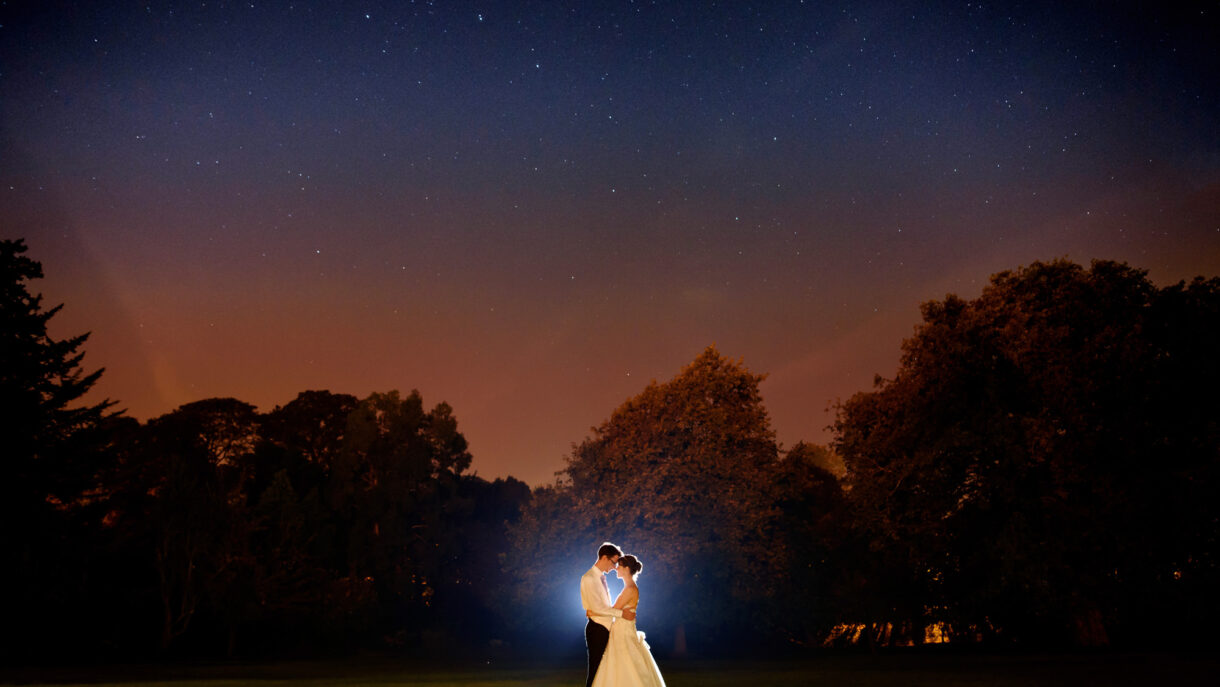 bride and groom portrait under the stars