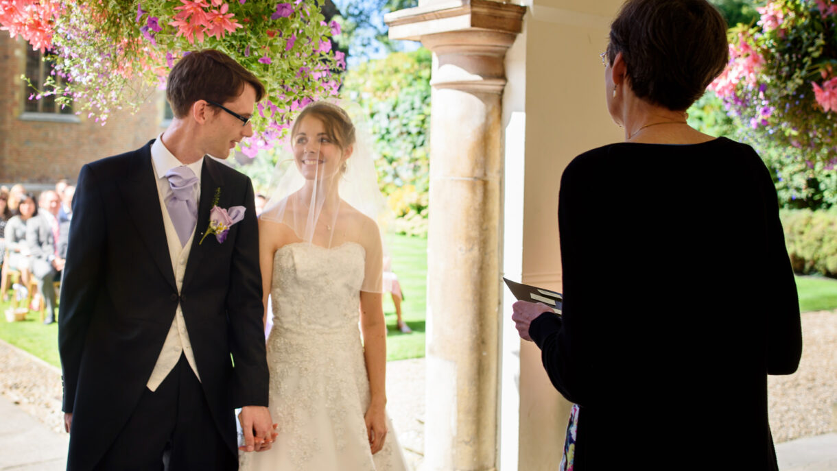 bride and groom looking at each other during ceremony